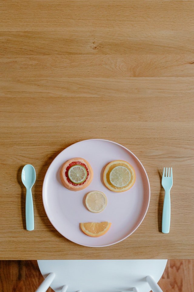 Picture of food on a plate smiling to represent food therapy anxiety treatment works!